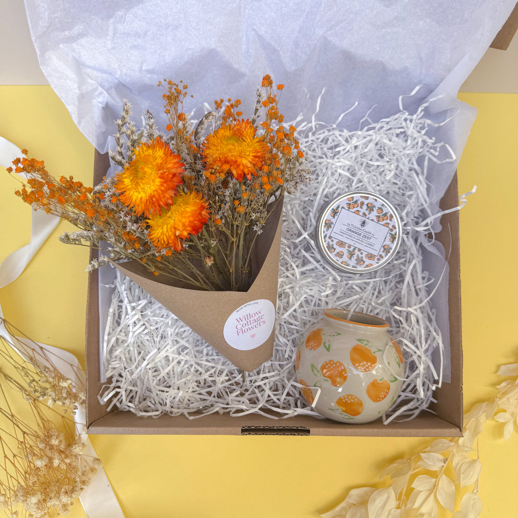 gift box with orange dry florals