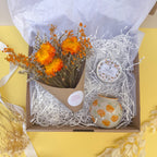gift box with orange dry florals