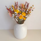 burnt orange and yellow spring dried flower bouquet