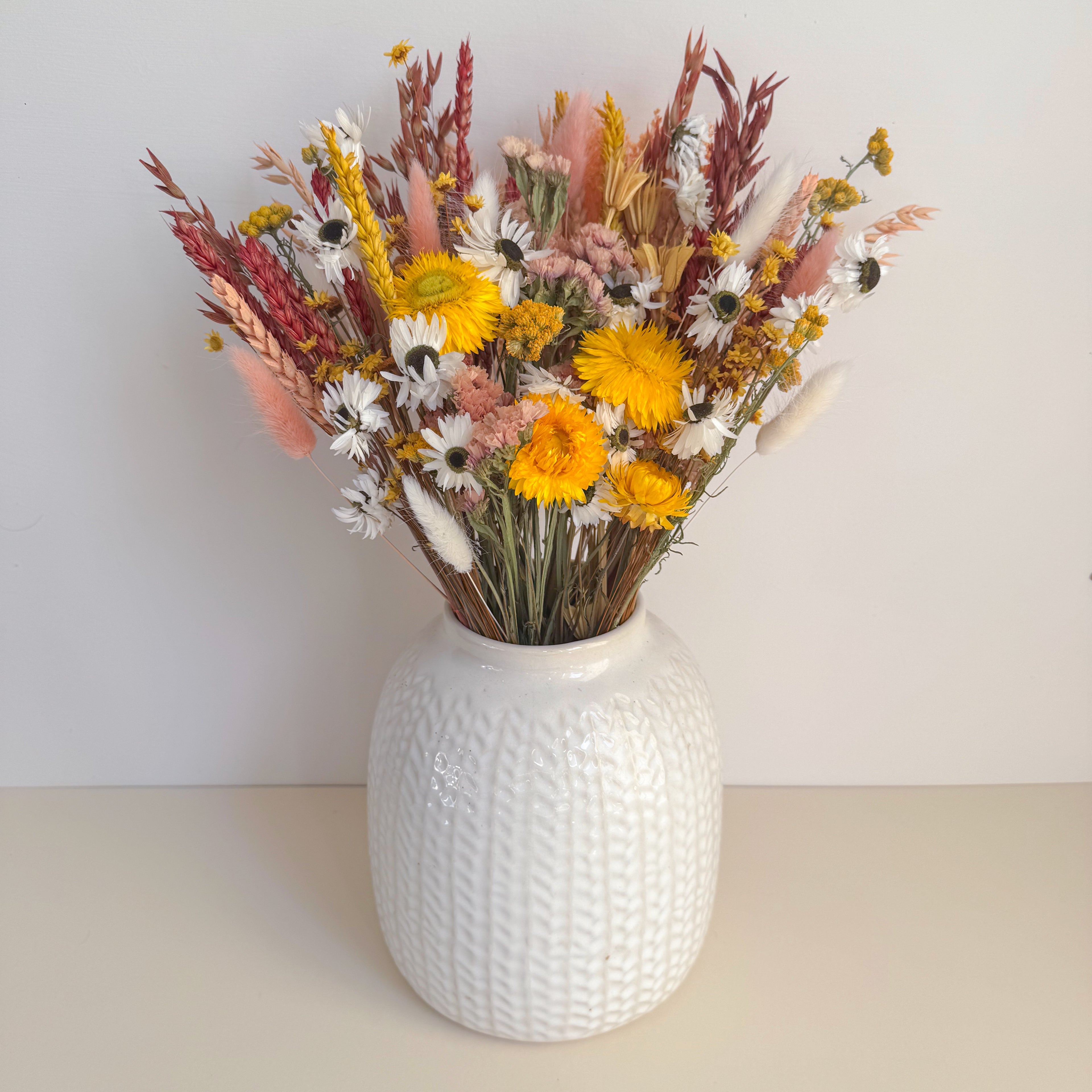 burnt orange and yellow spring dried flower bouquet