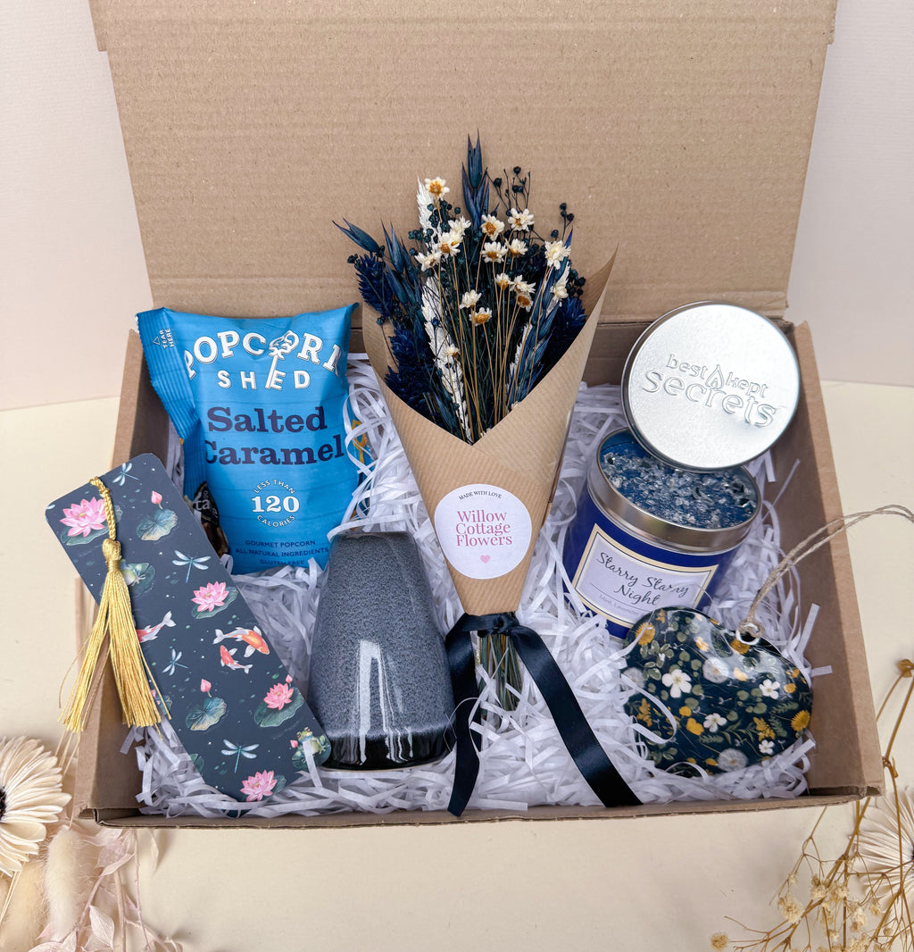 dark blue gift hamper with dried flowers