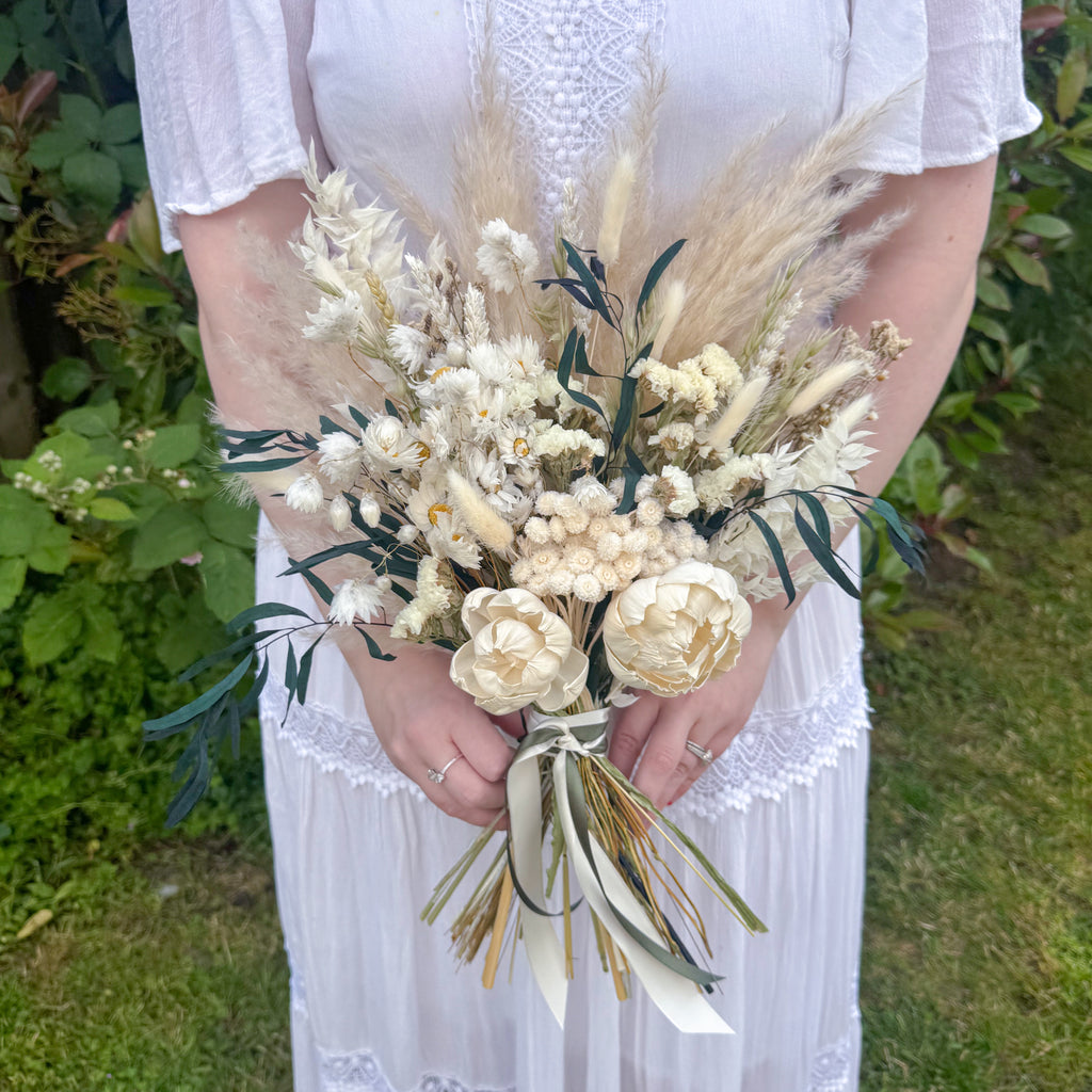 luxury white dried flower wedding bouquet with grasses
