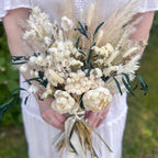 white sola flower bouquet with pampas