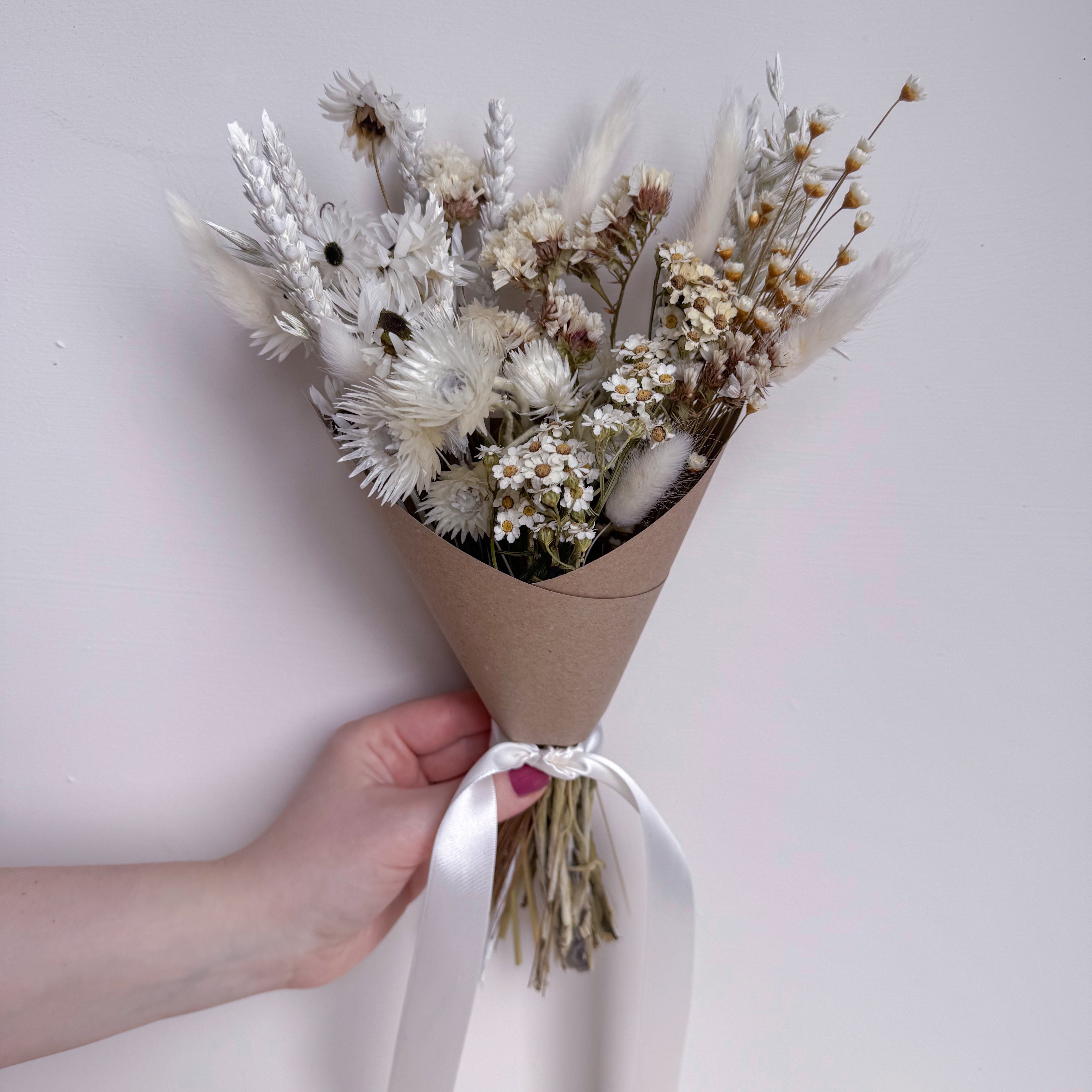 small white boho dried flower arrangement