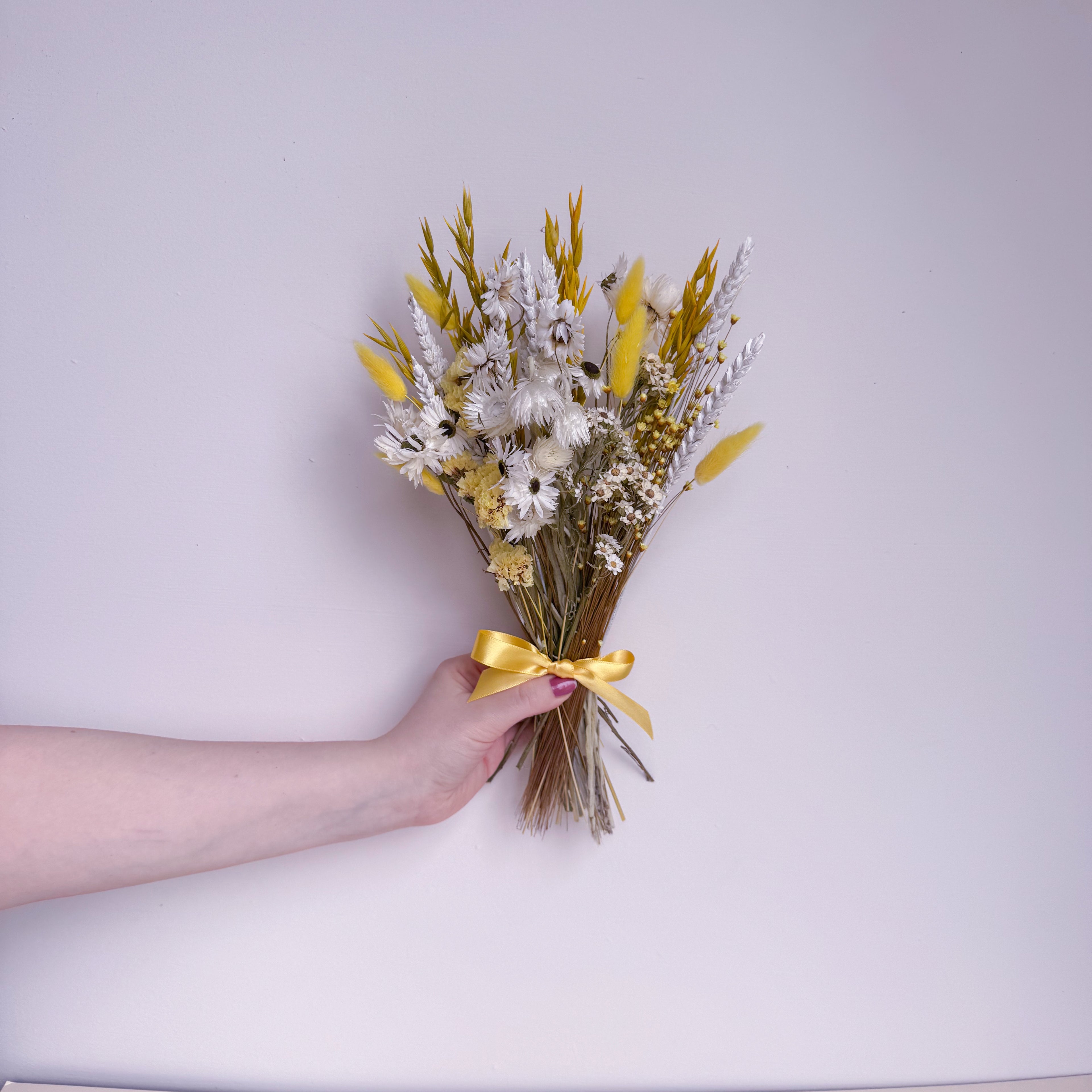 yellow wildflower bouquet with bunny tails